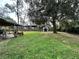 Large backyard with shed and covered patio at 14636 Bray Rd, Orlando, FL 32832