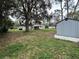 Backyard view, showing a shed and home at 14636 Bray Rd, Orlando, FL 32832