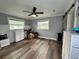 Spacious bedroom with new flooring and ceiling fan at 14636 Bray Rd, Orlando, FL 32832