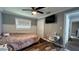 Spacious bedroom with a double bed, desk, and plenty of closet space at 14636 Bray Rd, Orlando, FL 32832