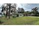 House with green lawn and driveway at 14636 Bray Rd, Orlando, FL 32832