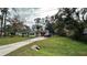 House with driveway and green lawn at 14636 Bray Rd, Orlando, FL 32832