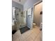 Bathroom with shower, tub, and double sinks at 148 Joewood Trl, Davenport, FL 33837