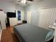 Guest bedroom with a queen bed and lots of closet space at 148 Joewood Trl, Davenport, FL 33837