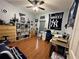 Spacious bedroom with wood floors, desk and storage at 148 Joewood Trl, Davenport, FL 33837