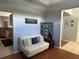 Cozy den with a sofa bed and view of the kitchen at 148 Joewood Trl, Davenport, FL 33837