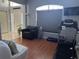 Bright room with home exercise equipment and hardwood floors at 148 Joewood Trl, Davenport, FL 33837