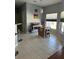 Spacious kitchen with granite countertops and stainless steel appliances at 148 Joewood Trl, Davenport, FL 33837