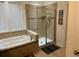 Bathroom with a large shower and garden tub at 15043 Pigeon Plum Ln, Winter Garden, FL 34787