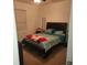 Bright bedroom with a double bed and a window at 15043 Pigeon Plum Ln, Winter Garden, FL 34787