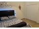 Bedroom with double bed and large closet at 15043 Pigeon Plum Ln, Winter Garden, FL 34787