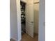 Shelving and hanging space in this closet at 15043 Pigeon Plum Ln, Winter Garden, FL 34787
