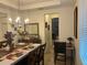 Dining room with access to the kitchen and hallway at 15043 Pigeon Plum Ln, Winter Garden, FL 34787