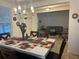Spacious dining area with a view into the living room at 15043 Pigeon Plum Ln, Winter Garden, FL 34787