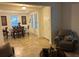 Bright dining room with a chandelier and table for six at 15043 Pigeon Plum Ln, Winter Garden, FL 34787