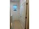 Laundry room with washer, dryer and storage at 15043 Pigeon Plum Ln, Winter Garden, FL 34787