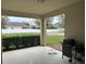 Covered patio with grill and view of backyard at 15043 Pigeon Plum Ln, Winter Garden, FL 34787