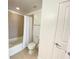 Clean bathroom with a bathtub, toilet and shower at 155 S Court Ave # 1603, Orlando, FL 32801
