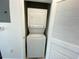 Stackable washer and dryer in a closet at 155 S Court Ave # 1603, Orlando, FL 32801