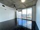 Living room with floor to ceiling windows and city views at 155 S Court Ave # 1603, Orlando, FL 32801