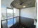 Living room with floor to ceiling windows and city views at 155 S Court Ave # 1603, Orlando, FL 32801