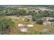 Aerial view of home on large lot with surrounding farm land at 1960 Murray Rd, Fort Meade, FL 33841