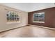 Bedroom with large windows and neutral colored walls at 1960 Murray Rd, Fort Meade, FL 33841