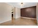 Dining Room with dark brown accent wall and chandelier at 1960 Murray Rd, Fort Meade, FL 33841