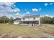 Two story home with large backyard and screened porch at 1960 Murray Rd, Fort Meade, FL 33841