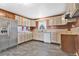 Kitchen with light cabinets, stainless steel appliances, and tile floors at 1960 Murray Rd, Fort Meade, FL 33841