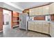 Kitchen with light cabinets, stainless steel appliances, and tile floors at 1960 Murray Rd, Fort Meade, FL 33841