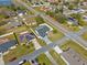 Aerial view of neighborhood featuring well-maintained yards and mature trees at 202 Cobalt Dr, Kissimmee, FL 34758