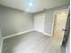 Bedroom with double door closet and view of hallway at 202 Cobalt Dr, Kissimmee, FL 34758