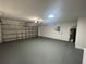 Attached garage with light gray floor and automatic door opener at 202 Cobalt Dr, Kissimmee, FL 34758