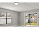 Bright Gathering room featuring sliding glass doors to backyard at 202 Cobalt Dr, Kissimmee, FL 34758