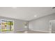 Spacious living room with sliding glass doors to backyard at 202 Cobalt Dr, Kissimmee, FL 34758