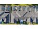 Aerial view of community, showcasing homes and pools at 2461 Reading Trl, Kissimmee, FL 34746