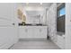 Bathroom with double vanity and bathtub at 2461 Reading Trl, Kissimmee, FL 34746