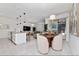 Modern kitchen with white cabinets and island at 2461 Reading Trl, Kissimmee, FL 34746