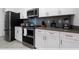 Modern kitchen with stainless steel appliances at 2461 Reading Trl, Kissimmee, FL 34746