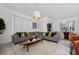 Spacious living room with comfortable sectional sofa at 2461 Reading Trl, Kissimmee, FL 34746