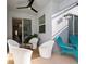 Relaxing patio with seating area, perfect for outdoor enjoyment at 2461 Reading Trl, Kissimmee, FL 34746