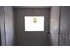 Bright bathroom space features with tiled walls and natural light from a window at 2531 Buena Vista Dr, Deland, FL 32724