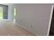 Spacious living room with a neutral color palette offers a blank canvas for customization at 2531 Buena Vista Dr, Deland, FL 32724