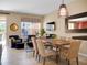 Inviting living and dining area with stylish furnishings and plenty of natural light at 2717 Coupe St, Kissimmee, FL 34746