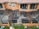 Aerial view of a home with a screened-in patio and hot tub at 2717 Coupe St, Kissimmee, FL 34746