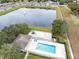 Aerial view of community pool, pond, and recreational areas at 2717 Shelby Ruth Pl, St Cloud, FL 34769