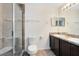 Bathroom with double vanity, large shower, and tile floors at 2717 Shelby Ruth Pl, St Cloud, FL 34769