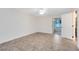 Bright bedroom with tile floors and sliding glass door leading to patio at 2717 Shelby Ruth Pl, St Cloud, FL 34769