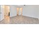 Bedroom with tile floors and access to bathroom and closet at 2717 Shelby Ruth Pl, St Cloud, FL 34769